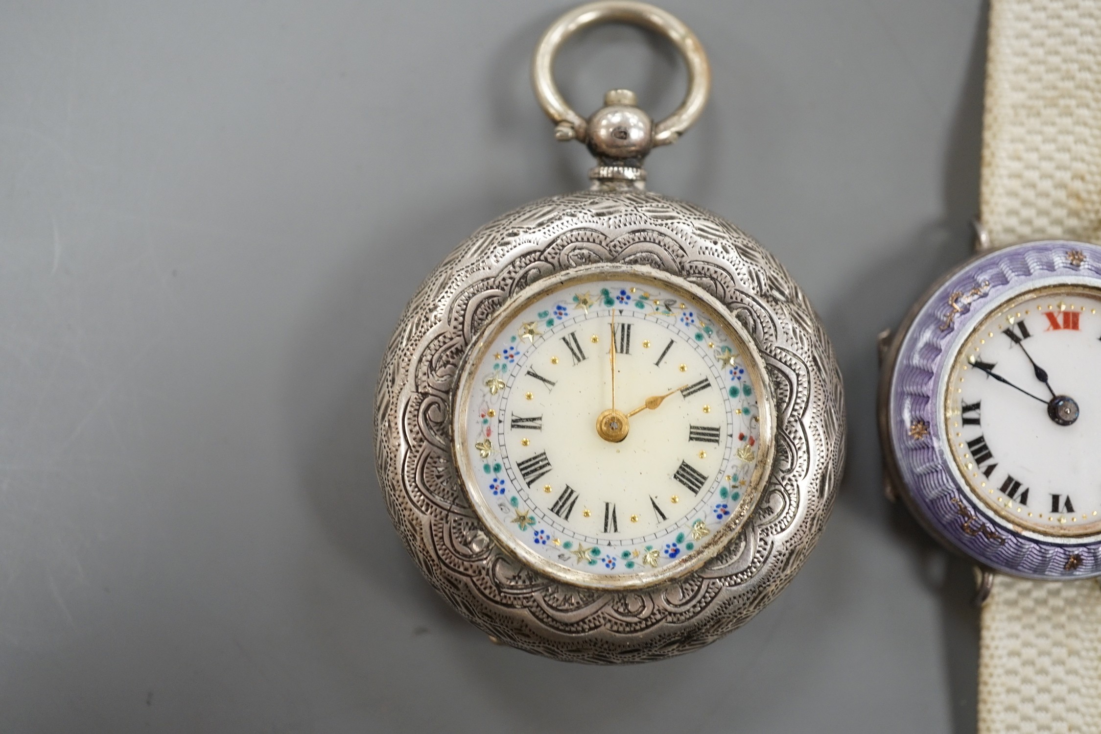 A lady's early 20th century silver and enamel manual wind wrist watch and an 800 standard white metal fob watch.